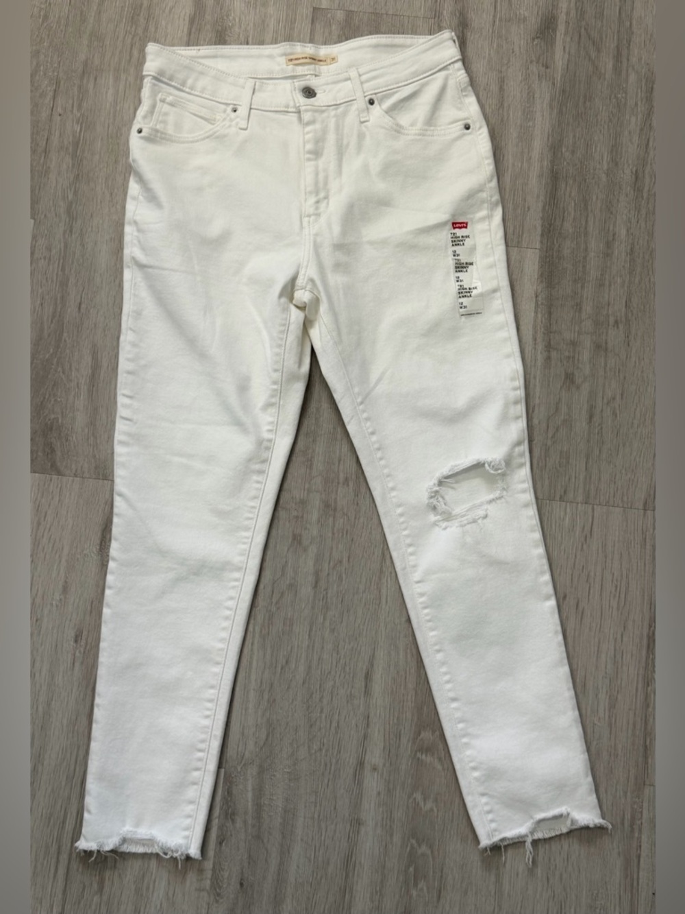 971: Levi's White 721 High-Rise Skinny Ankle Jeans - 31